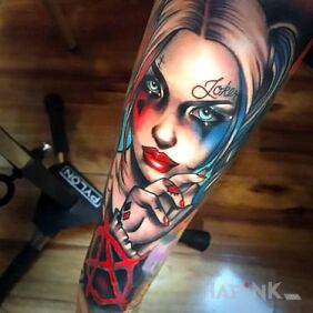 Tattoo Anarchic Harley on the forearm motif: colorful style: graphic / illustrative