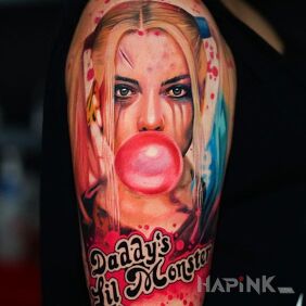 Tattoo Daddy's Lil Monster on the upper arm motif: characters style: realistic