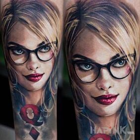Tattoo Ms. on the forearm motif: faces style: realistic