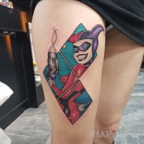Tattoo Harley Quinn from the cartoon on the leg motif: characters style: cartoon / comic book