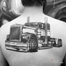 Tattoo A piece of truck on the back motif: motorization style: realistic