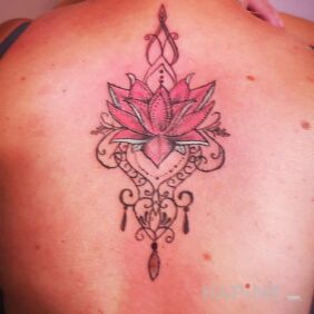 Tattoo Mandala on the back motif: colorful style: graphic / illustrative