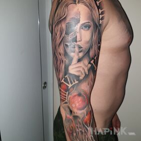 Tattoo CDN on the upper arm motif: colorful style: realistic