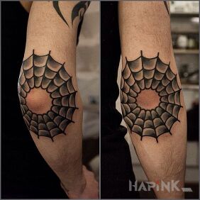 Tattoo Elbow web on the forearm motif: black and gray style: oldschool