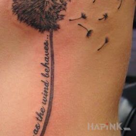 Tattoo Blower vs. wind on the ribs motif: flowers style: realistic