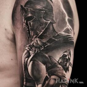 Tattoo Two perspectives on the upper arm motif: black and gray style: realistic