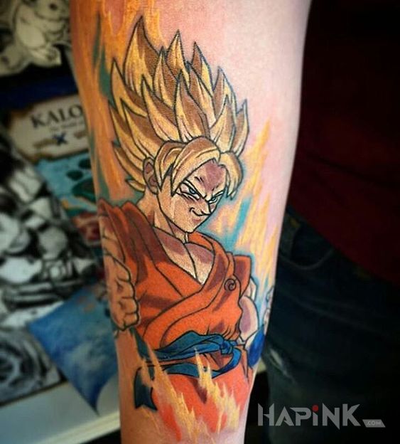 Tattoo Usmiechniety songo in colorful motif and cartoon / comic book style on the forearm