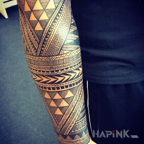 Tattoo Triangles of Polynesia on the forearm motif: black and gray style: Polynesian