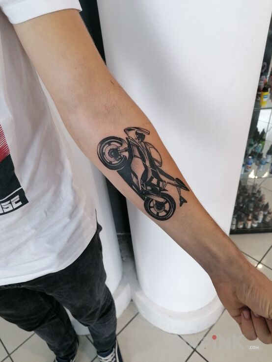 Tattoo Mój nowy motocykl in other motif and realistic style on the forearm