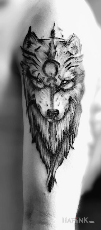 Tattoo Wilk in black and gray motif and graphic / illustrative style on the upper arm