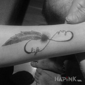 Tattoo LOVE_LIFE on the forearm motif: other
