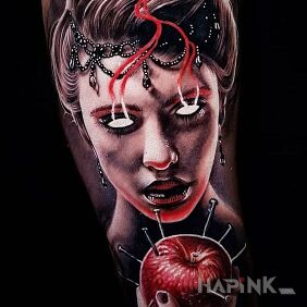 Tattoo Nabbed apple on the forearm motif: 3D style: realistic