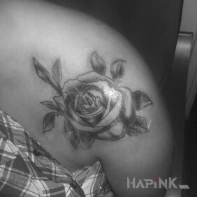 Tattoo Rose on the upper arm motif: flowers
