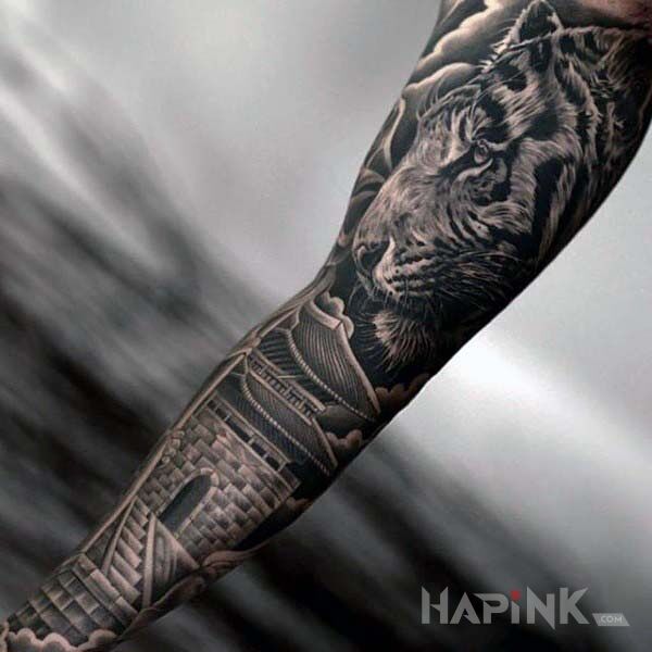 Tattoo Tygrys nad pagodą in animals motif and realistic style on the upper arm
