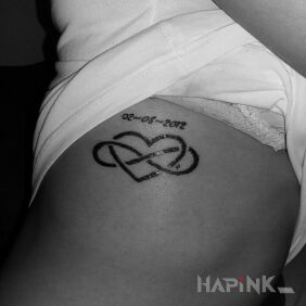 Tattoo Infinite love on the ribs motif: Love