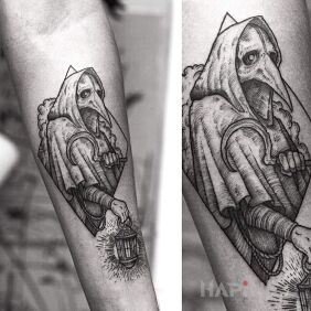 Tattoo Plague Doctor on the forearm motif: black and gray style: engravings / gravure