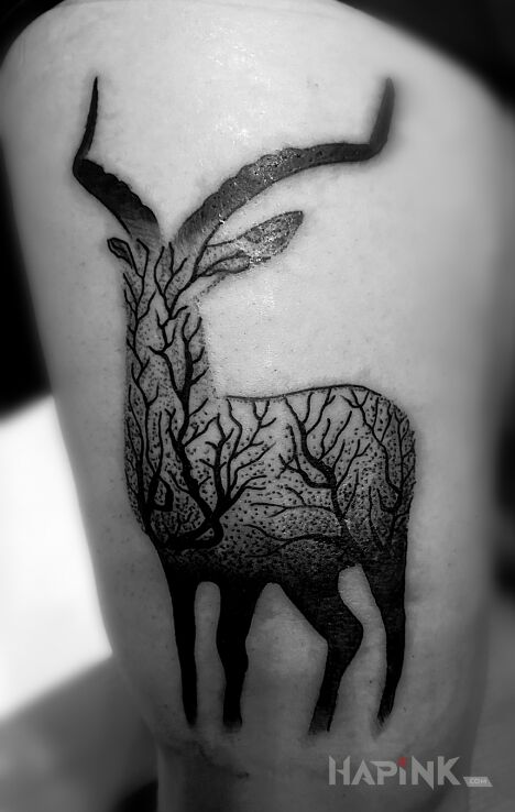 Tattoo Mała wariacja in black and gray motif and graphic / illustrative style on the leg