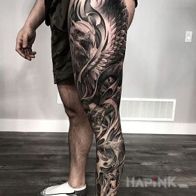 Tattoo Epic Eagle on the tibia motif: black and gray style: realistic