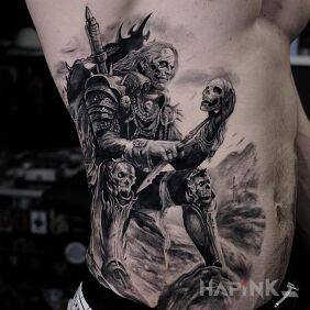 Tattoo Necromancer on the stomach motif: dark style: realistic