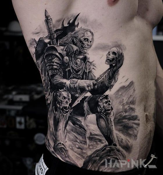 Tattoo Nekromanta in characters motif and realistic style on the ribs