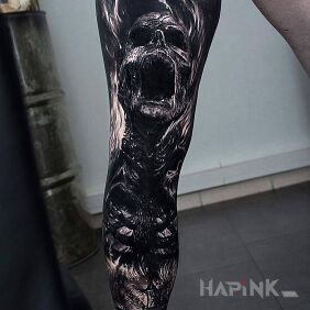 Tattoo Cry of pain on the leg motif: black and gray style: realistic