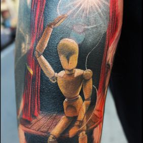 Tattoo Marionette on the leg motif: colorful style: realistic