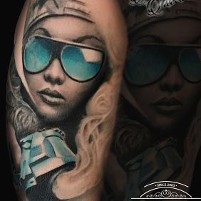 Tattoo Gun on the upper arm motif: 3D style: realistic