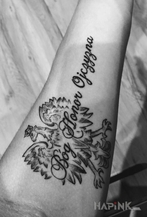 Tattoo Patriotyczny in lettering motif and graphic / illustrative style on the forearm