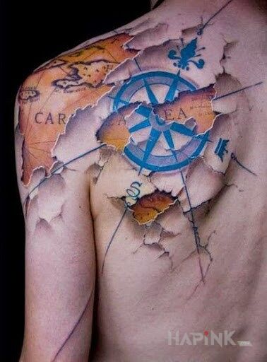 Tattoo Kompas in other motif on the upper arm