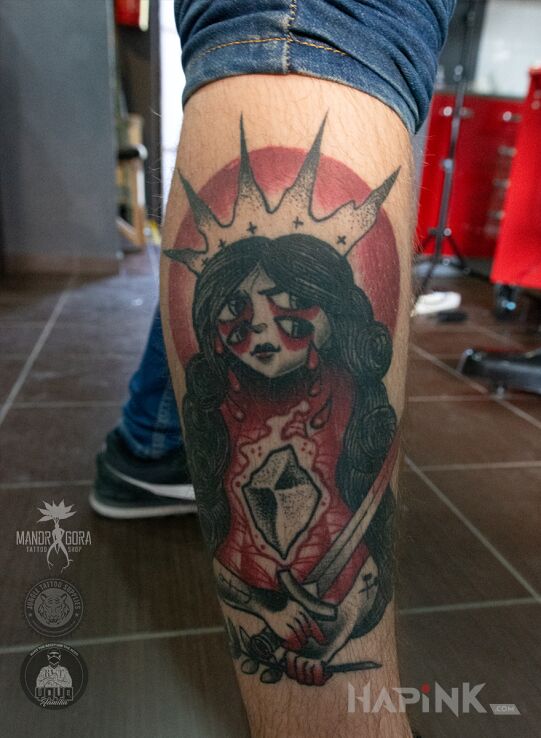Tattoo Święta Barbara in characters motif and graphic / illustrative style on the calf