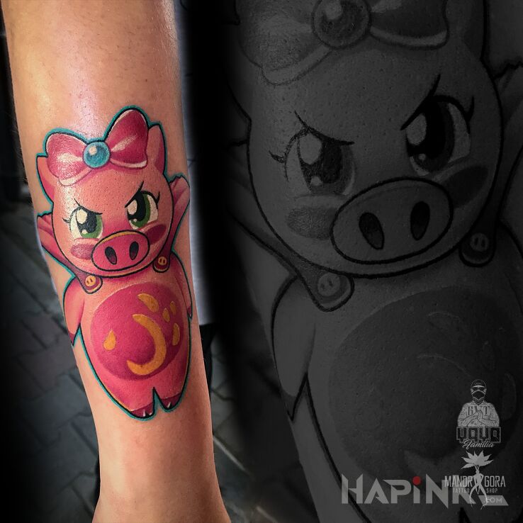Tattoo Super świnka in colorful motif and newschool style on the forearm