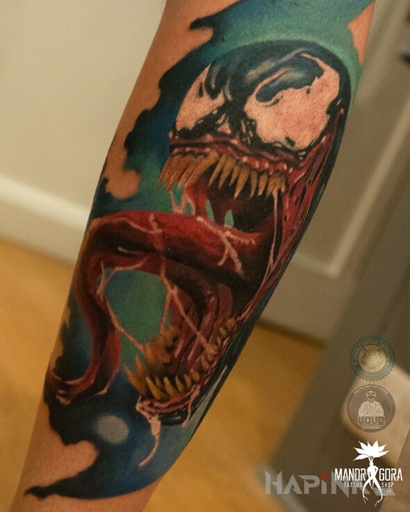 Tattoo Venom in characters motif and realistic style on the leg
