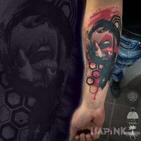 Tattoo Trashpolka - mouth on the forearm motif: colorful style: trash polka