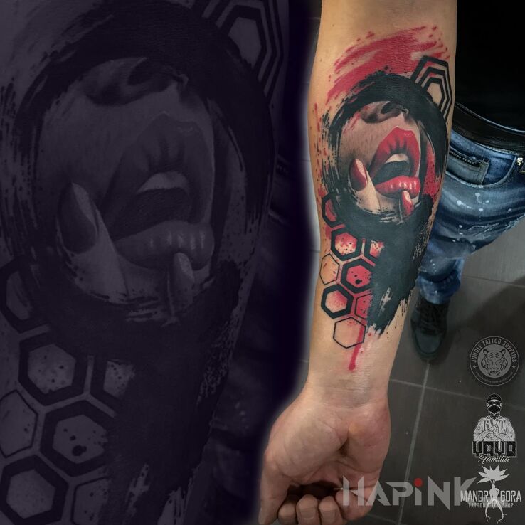 Tattoo Trashpolka - usta in colorful motif and realistic style on the forearm