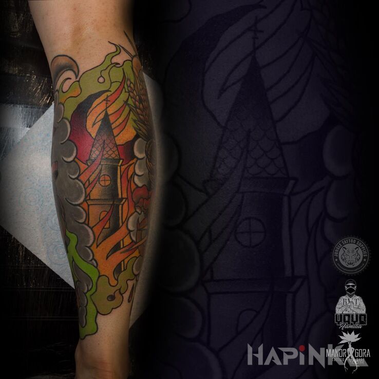 Tattoo Płonący kościół in religious motif and neo-traditional style on the calf