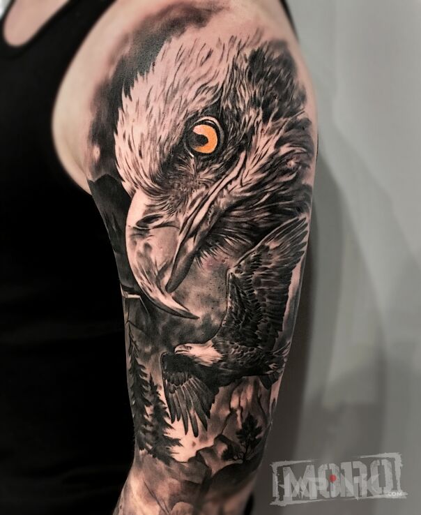 Tattoo Orzeł, orły, las in black and gray motif and realistic style on the upper arm