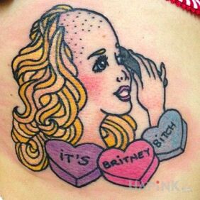 Tattoo Britney spears? on the upper arm motif: characters