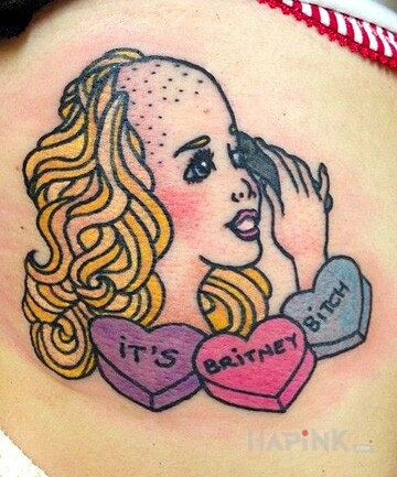 Tattoo Britney spears? in characters motif on the upper arm