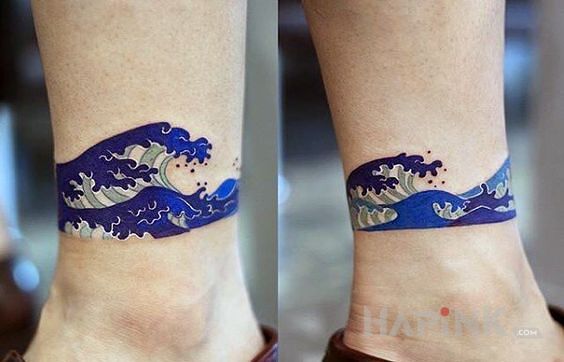 Tattoo Fala in colorful motif and japanese / irezumi style near the ankle