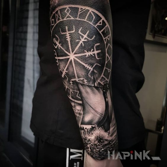Tattoo Okręt wikingów in black and gray motif and realistic style on the forearm