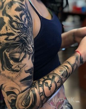 Tattoo Tiger is back in faces motif and realistic style on the forearm
