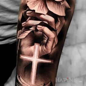 Tattoo Faith on the forearm motif: religious style: realistic