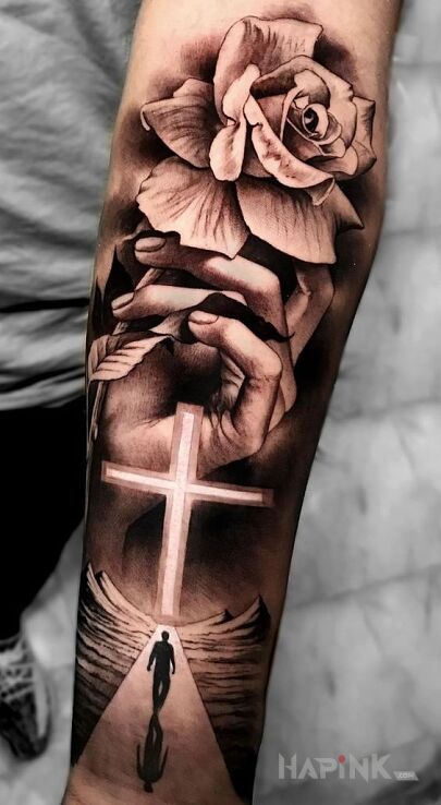 Tattoo Wiara in religious motif and realistic style on the forearm
