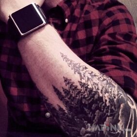 Tattoo An array of trees on the forearm motif: other