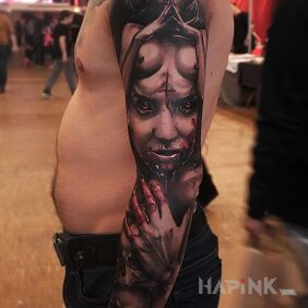 Tattoo Sleeve with demonic woman on the forearm motif: black and gray style: realistic