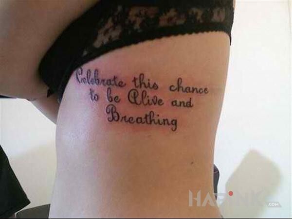 Tattoo Napis na  żebrach in lettering motif on the ribs