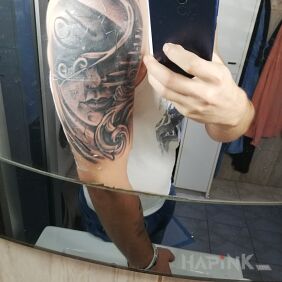 Tattoo Stairs on the upper arm motif: black and gray style: realistic