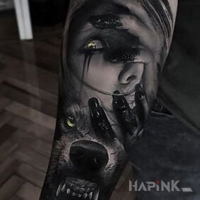 Tattoo Wolfhound on the forearm motif: dark style: realistic