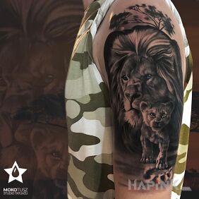 Tattoo Two Lions on the upper arm motif: 3D style: realistic