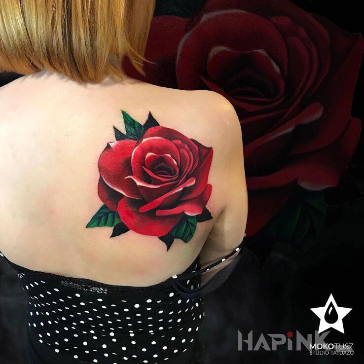 Tattoo Klasycznie. Rose Tattoo. in flowers motif and realistic style on the shoulder blades